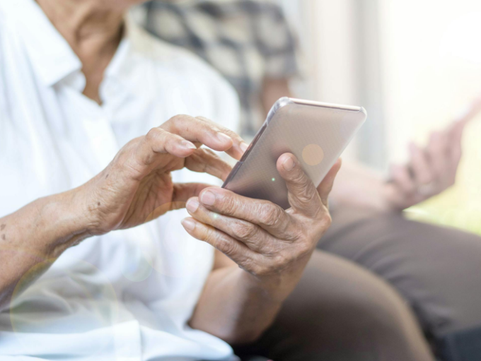 A senior using a cell phone